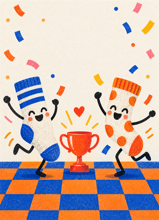 Two smiling socks dancing beside a trophy under confetti